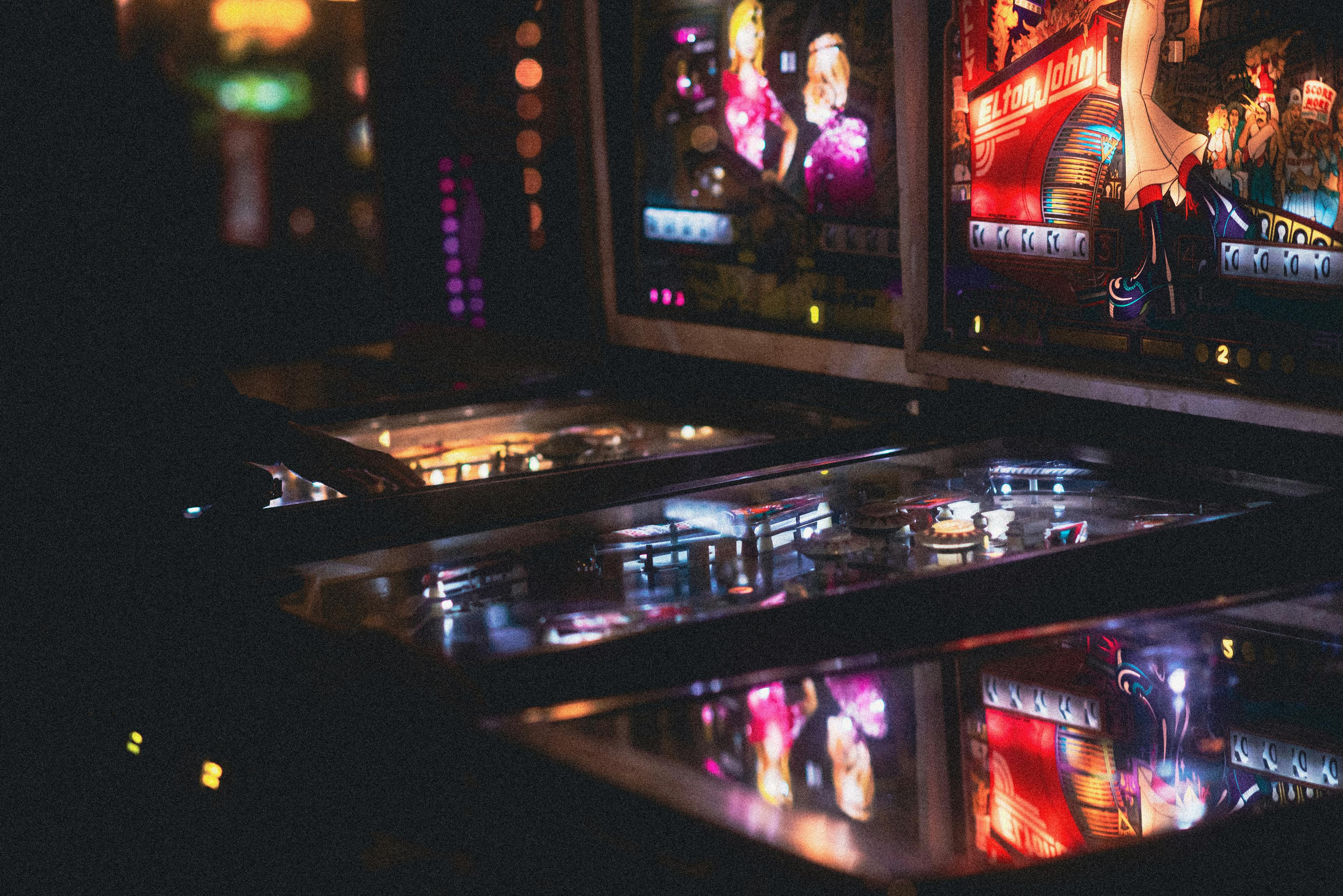 Close-up of a lit pinball machine